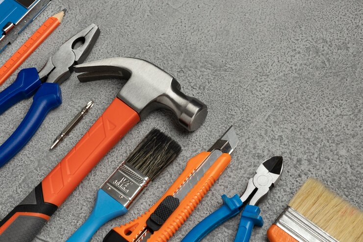 view-steel-hammer-with-other-construction-elements-tools_23-2150576414